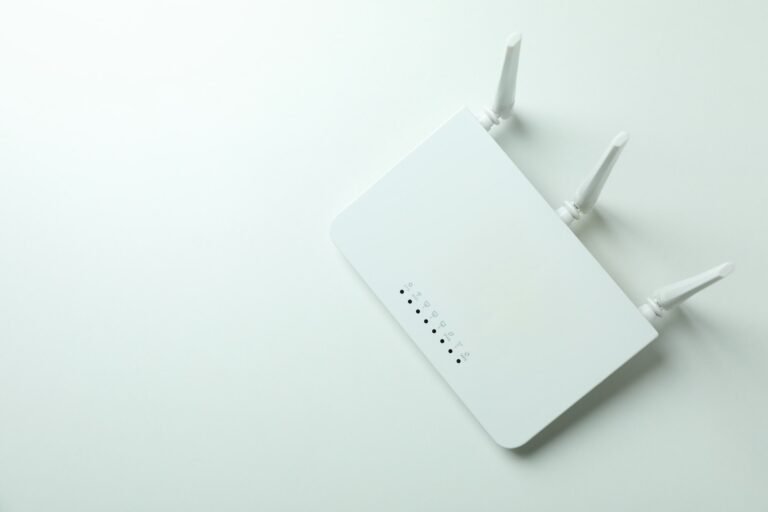 Wi-Fi router with external antennas on white background